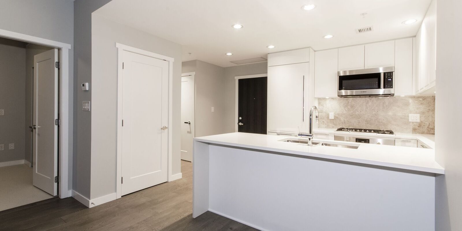 Contemporary NEW Condo in the heart of Lower Lonsdale with Ocean View